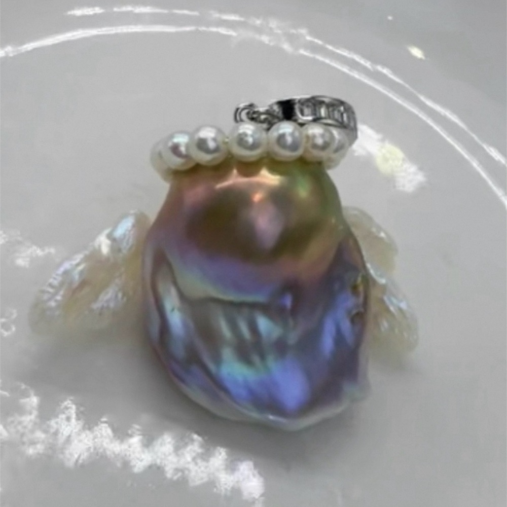 Iridescent Baroque Pearl Angel Pendant with Silver Accents